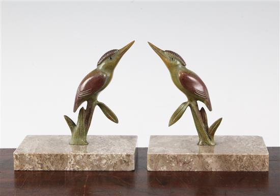 A pair of French Art Deco cold painted bronze bookends, modelled as humming birds, 5.75in.